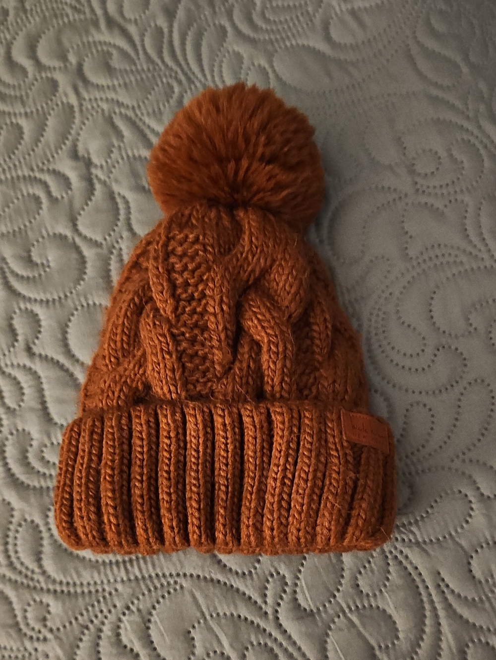 Nicole Miller Pom Pom Cable Knit Beanie - Rust